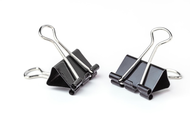 Binder clips on white background