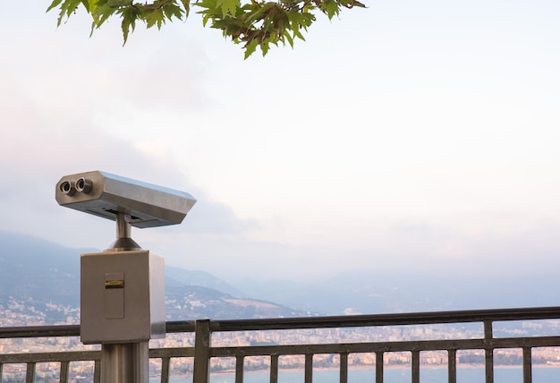 Binocular against observation deck view