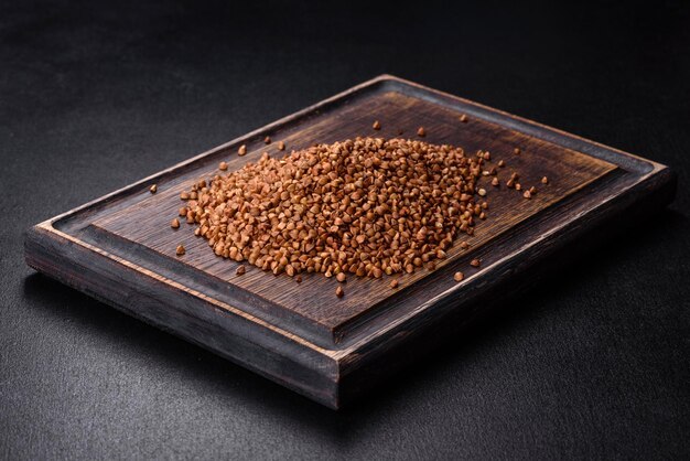 Bio buckwheat cereals raw food background texture close up The concept of healthy food cooking with love