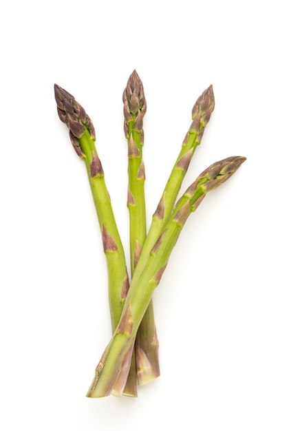 Bio fresh green asparagus isolated on white surface.