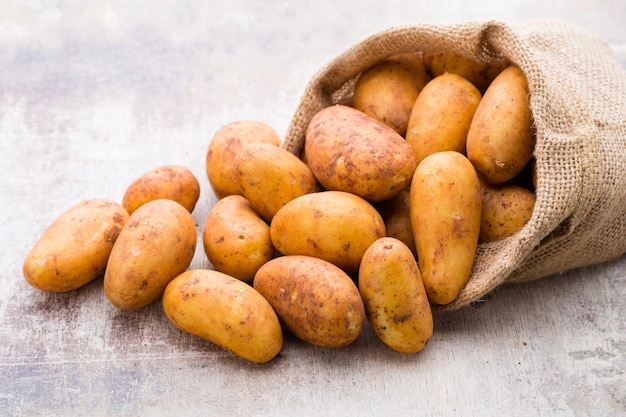 A bio russet potato wooden vintage table.