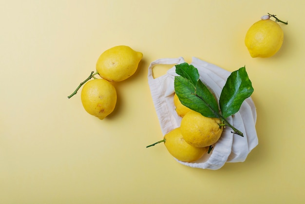 Biological lemons with green leaves