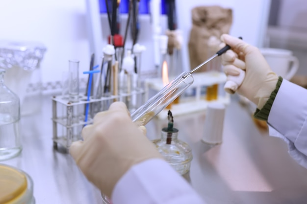 Biologist in the lab working with bacteria