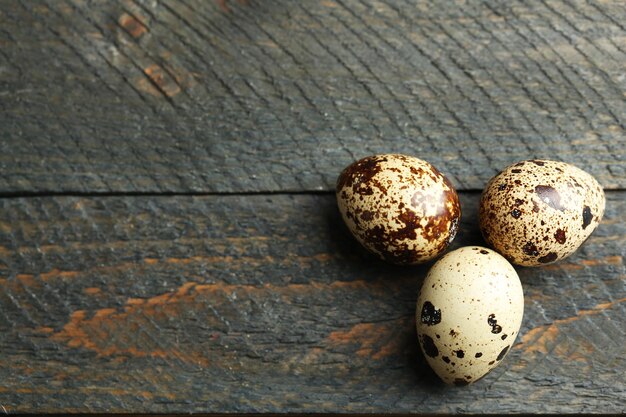 Bird eggs on wooden background