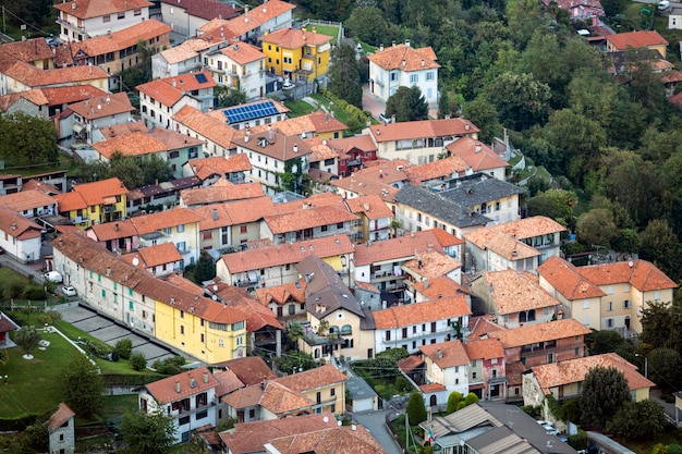 A bird's eye view of a village with a red roofs