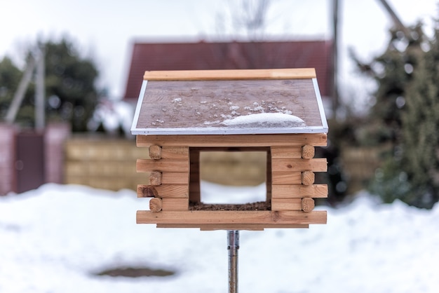 Birdhouse for birds in the yard in winter