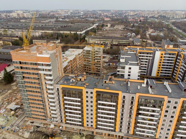 Birds eye view on contraction site with crane