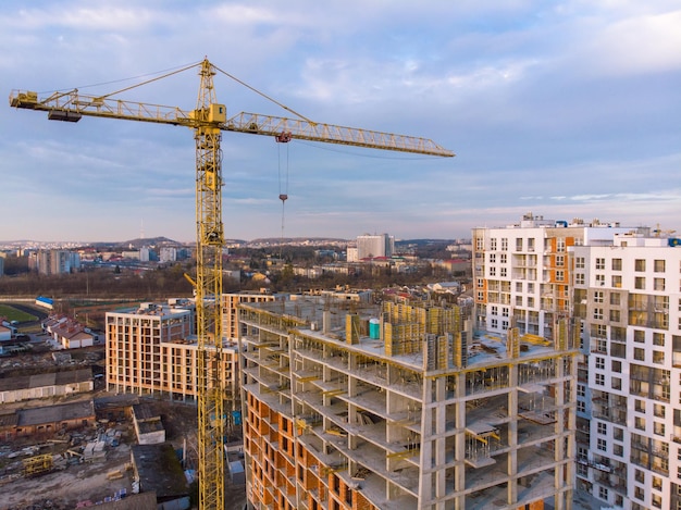 Birds eye view on contraction site with crane