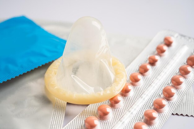 Birth control pills and condom contraception health and medicine