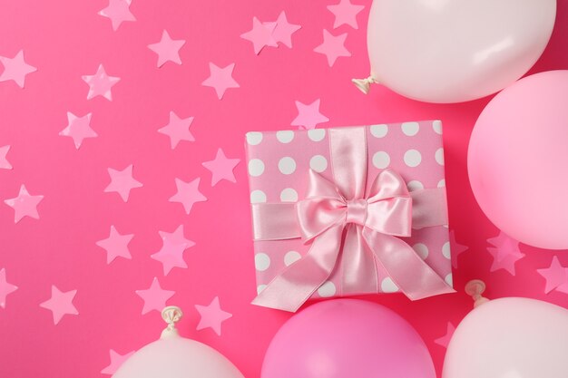 Photo birthday accessories on pink background, space for text