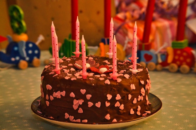 Birthday cake for the anniversary Candles on the cake Chocolate cake to celebrate