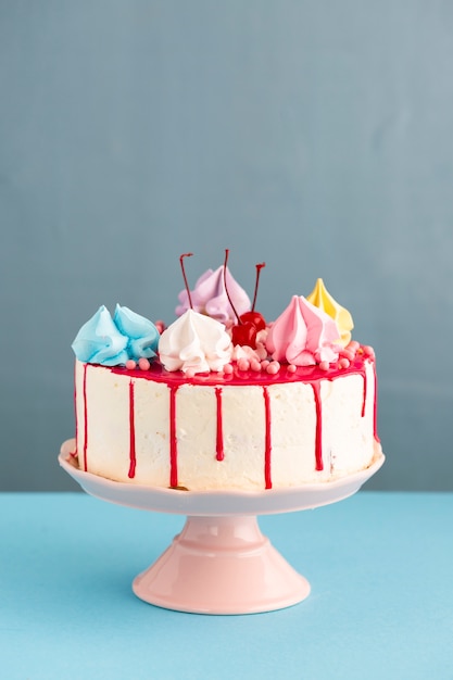 Photo birthday cake with glaze and cherries