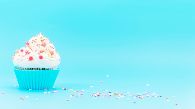 Birthday cupcake with confetti