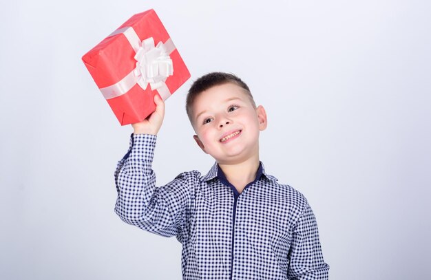 Birthday gift Birthday boy Buy gifts Child little boy hold gift box Christmas or birthday gift Holiday shopping seasonal sale Wellbeing and positive emotions Celebrate new year valentines day