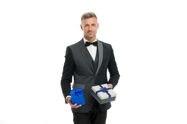 Birthday holiday. Shopping mall. Shop purchase. Gift package. Womens day. Valentines day. Gentleman delivering gift. Handsome man with wrapped gift box. Happy businessman hold present in hand.