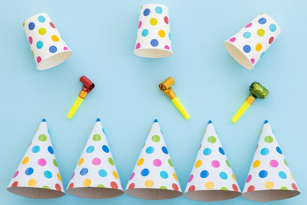 Birthday party hats on blue background