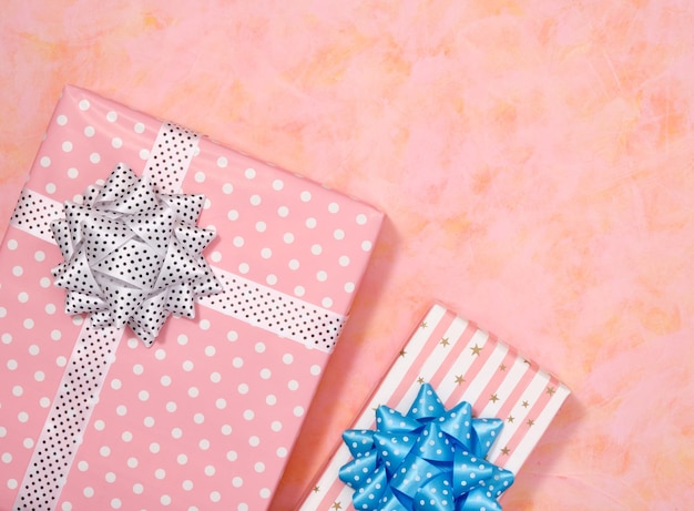 Birthday surprise flat lay Gift boxes with bright colorful bows