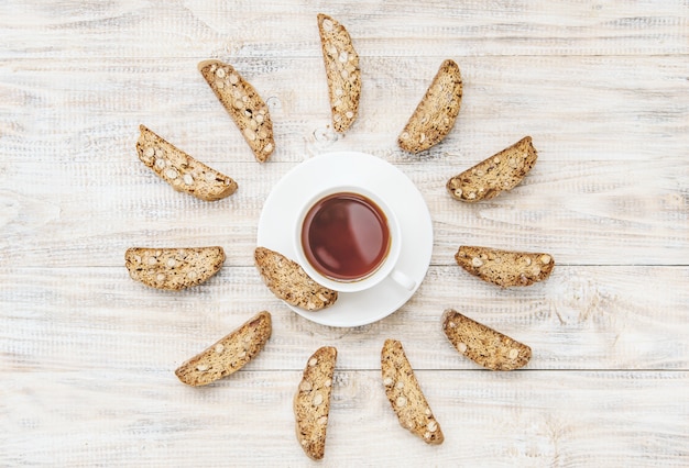 Biscotti on a light background. Tasty breakfast. Selective focus.