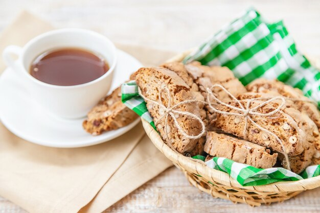 Biscotti on a light background. Tasty breakfast. Selective focus.