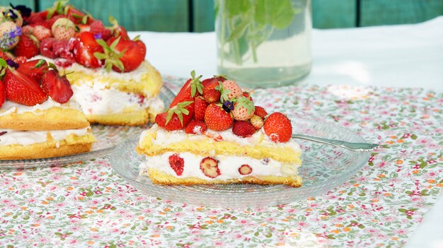 Biscuit cake summer with cream and berries