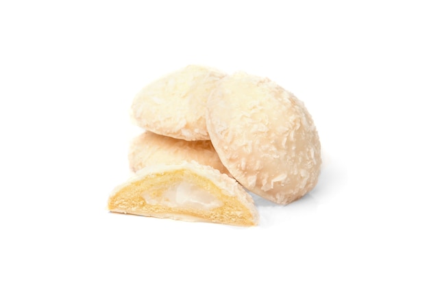 Biscuit cookies with coconut filling isolated on white.