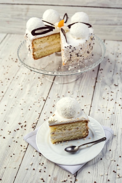 Photo biscuit with cream decorated by marshmallow and chocolate