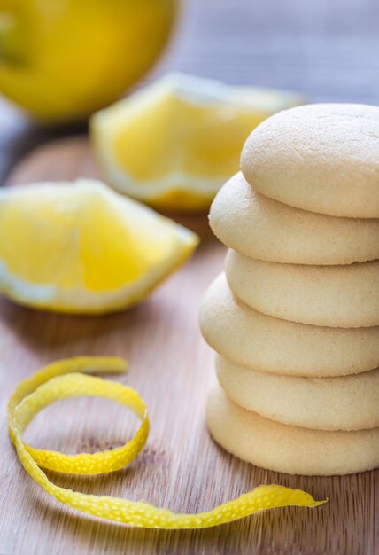 Biscuits filled with lemon cream on the wooden board