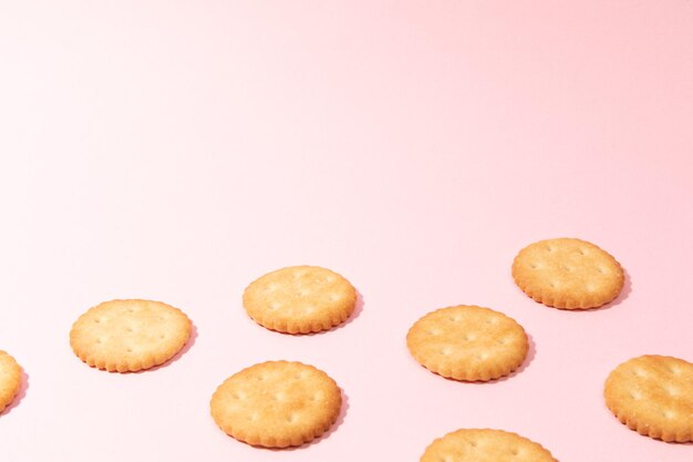 Biscuits on a pink background