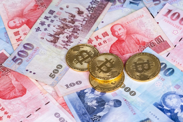 Bit Coin with New Taiwan Dollar banknote