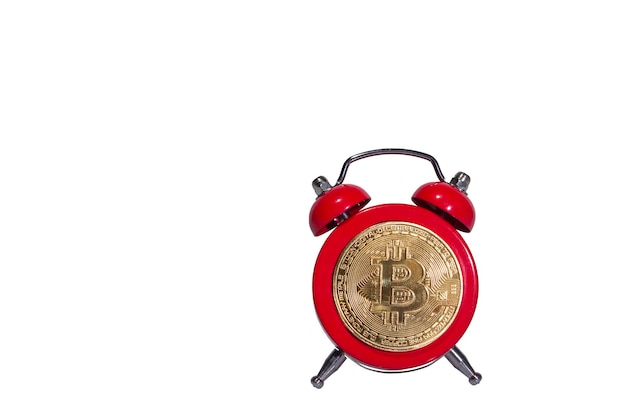 Bitcoin and alarm clock on black background Deadline concept for investing in bitcoin cryptocurrency