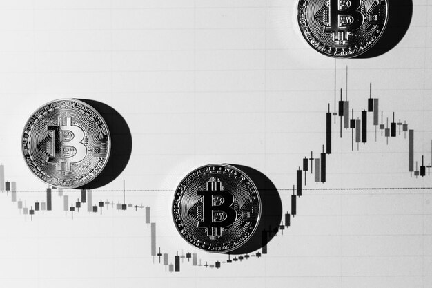 黒と白の背景のビットコイン暗号通貨取引の財政的依存