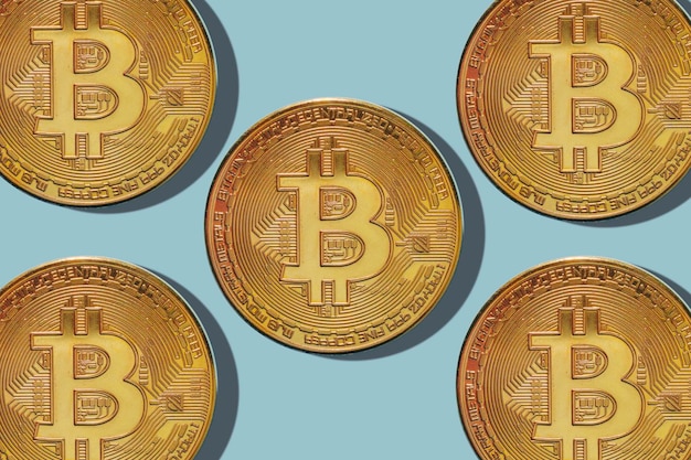 Bitcoin on a blue background currency of the future high quality photo