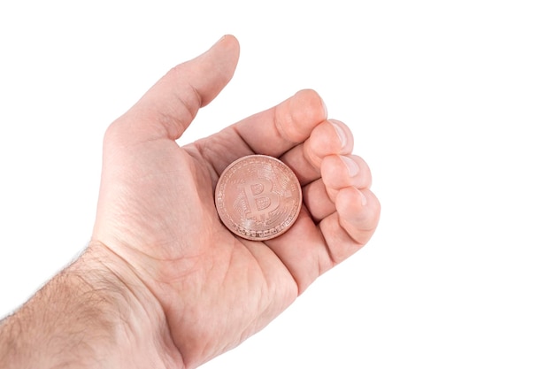 bitcoin coin in male palm isolated on white background