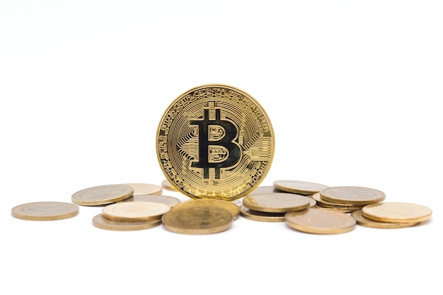 Bitcoin and coins on white background