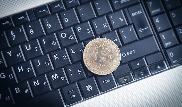 Bitcoin on the computer keyboard.