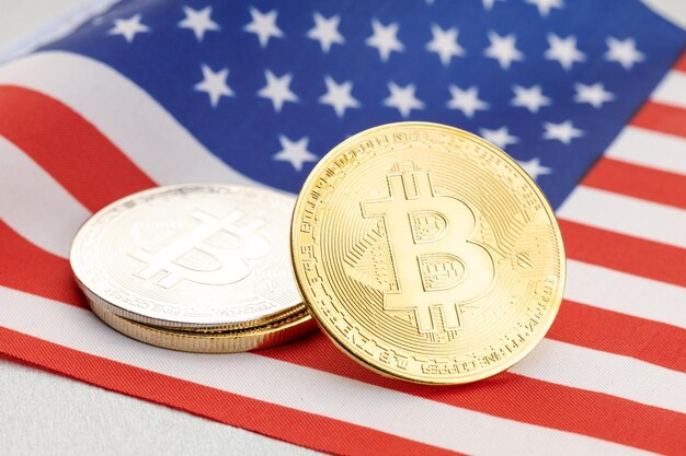 Bitcoin cryptocurrency coins on national flag of united states crypto law regulation concept