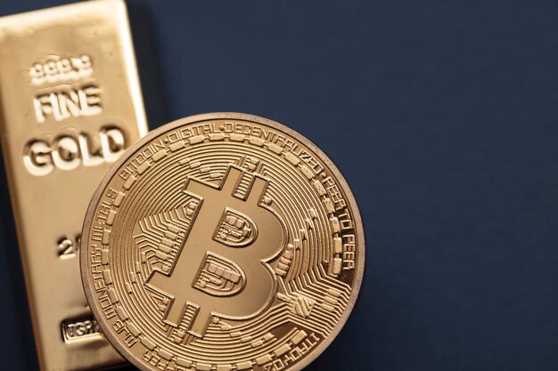 Bitcoin cryptocurrency-munt met een investeringsconcept van goudstaven