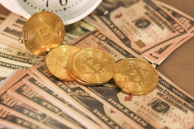 Photo bitcoin and dollar on the bed