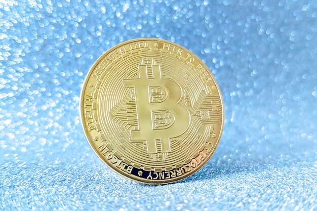 Bitcoin gouden munt en intreepupil glitter achtergrond