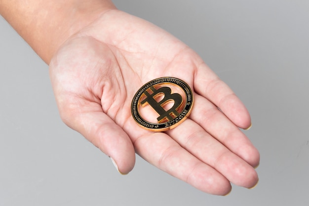 Photo bitcoin on the hand