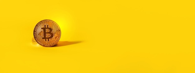 Un bitcoin appoggiato su un mucchio di bitcoin su sfondo giallo, layout panoramico