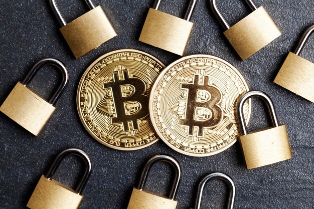 Bitcoin security concept Gold coin with padlock