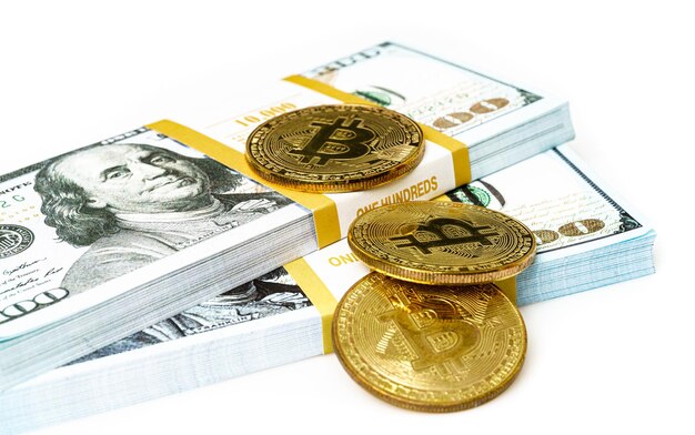 Bitcoin on US dollar banknotes cryptocurrency business background
