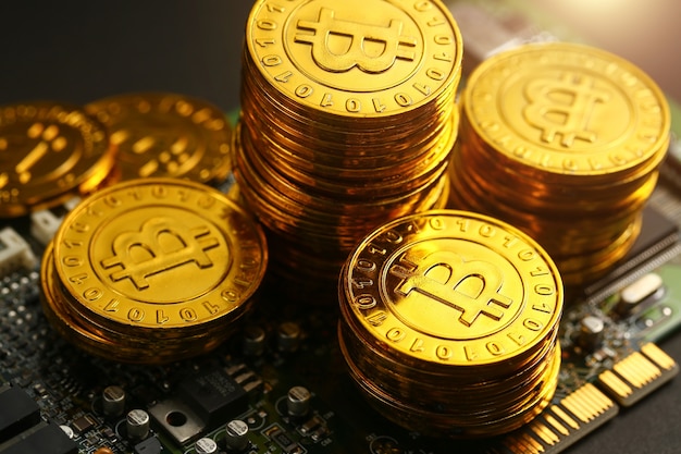 Photo bitcoins on circuit board