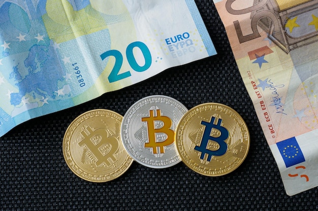 Bitcoins closeup on euro currency background