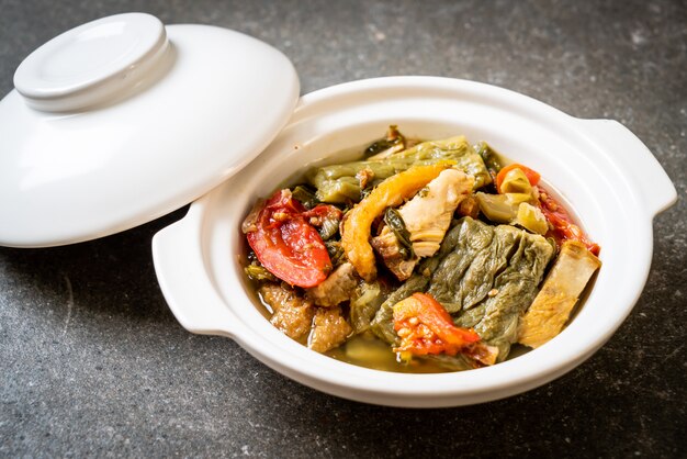 Bitter gourd and preserved mustard green soup with pork