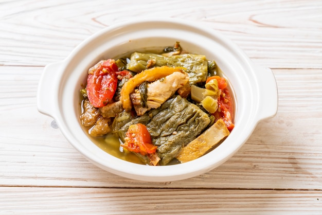 Bitter gourd and preserved mustard green soup with pork