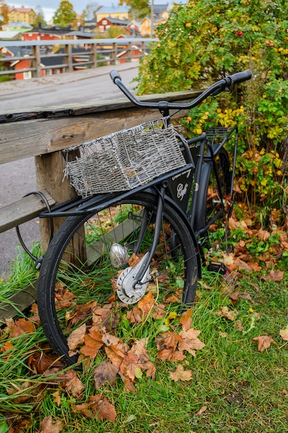 Black abandoned Bicycle with basket.