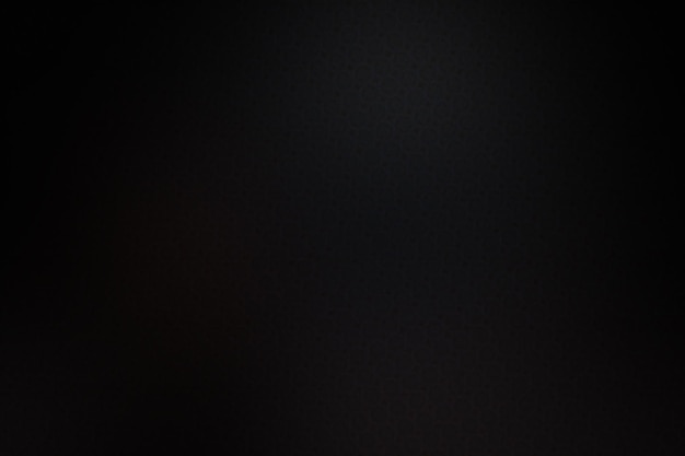 Black abstract background with blur and bokeh effect Copy space