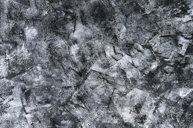 Black abstract background with cement texture
